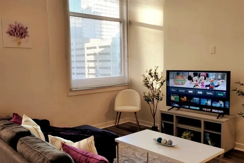 A living room with a tv and couch