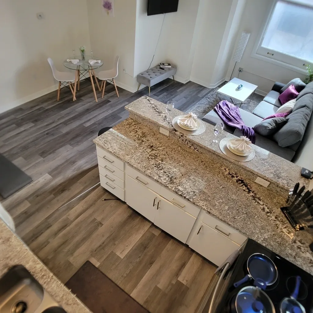 A kitchen with a counter and a sink